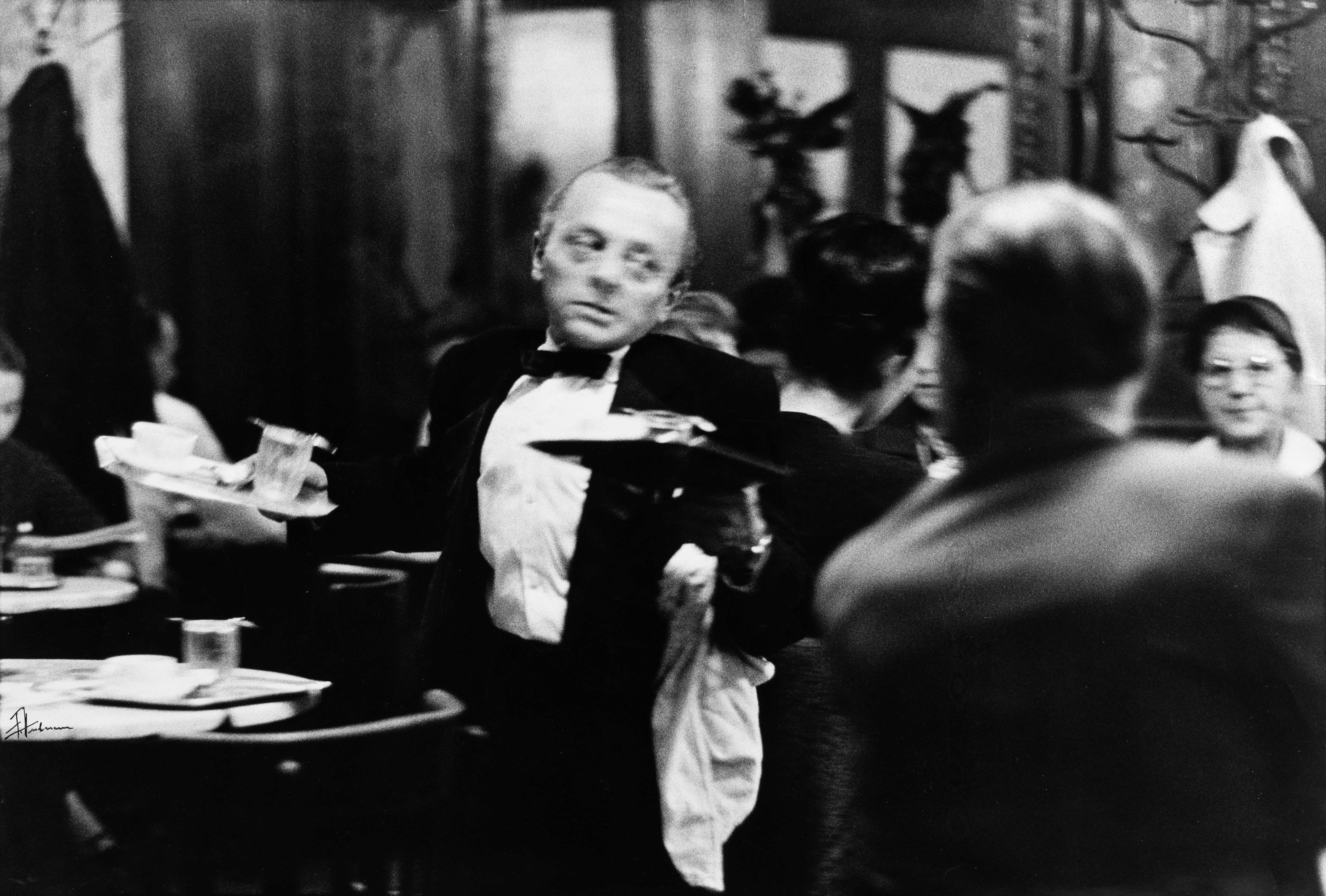 FRANZ HUBMANN (1914–2007) The legendary waiter Ali at Cafe Hawelka, Vienna 1957