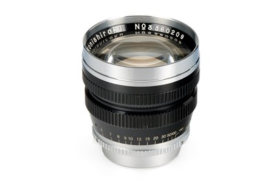 Lot 154 - Konishiroku f.M39 Hexanon 1.2/60mm Black/Chrome Set